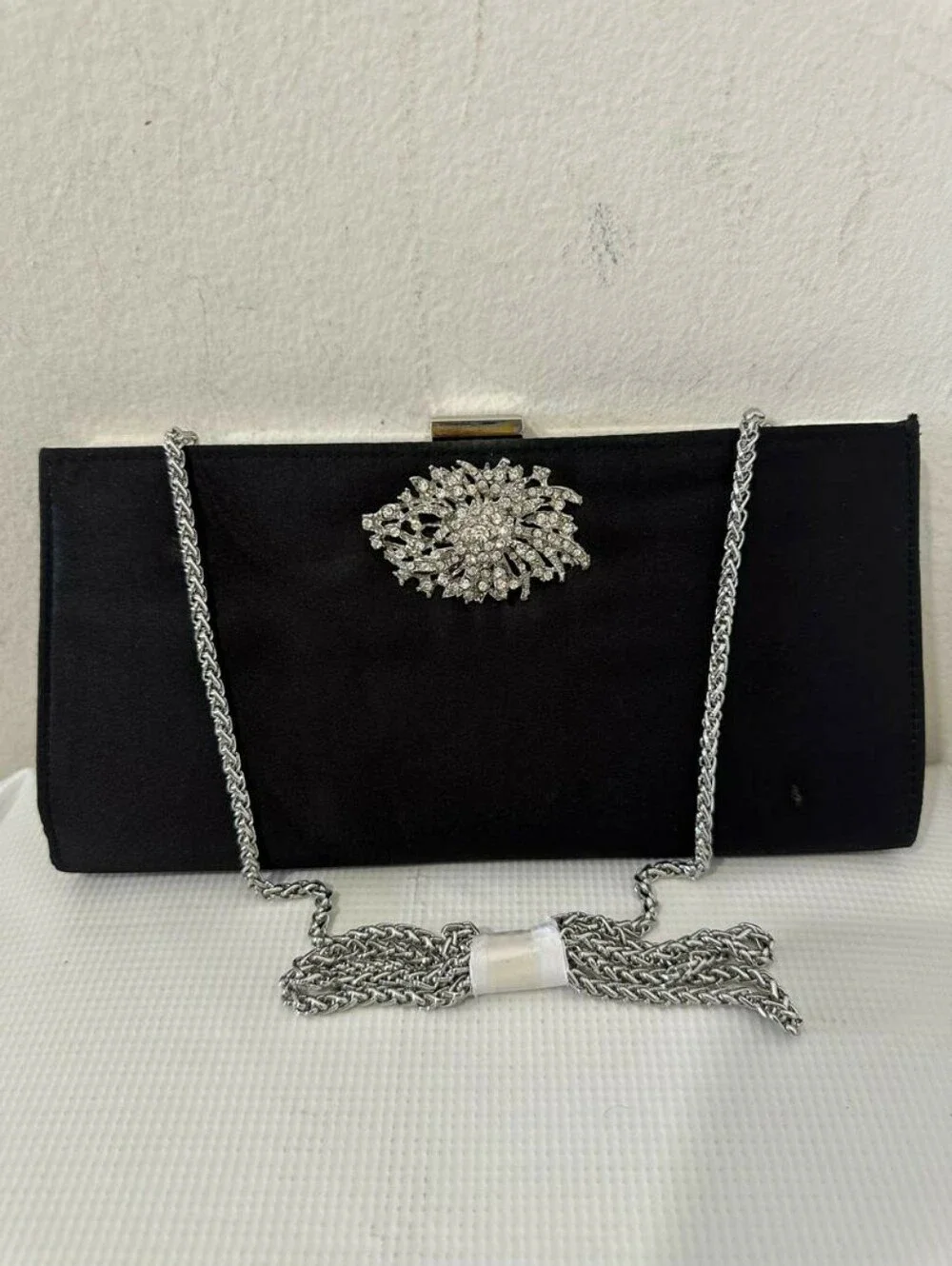 Women Black Papell Clutch Features  Prominent Crystal-embellished Brooch Closure